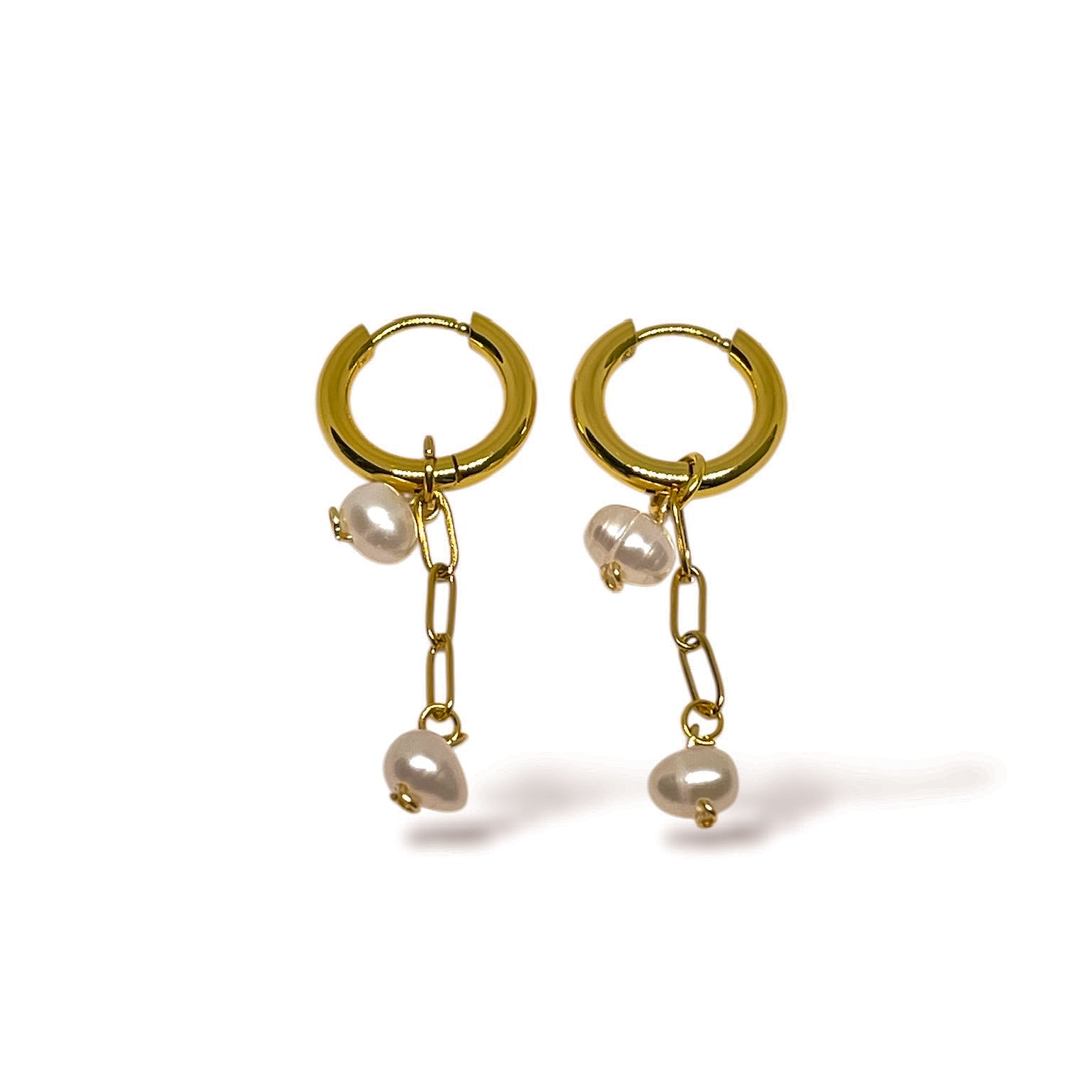 ARETES COLGANTES DOBLE PERLA DE RÍO